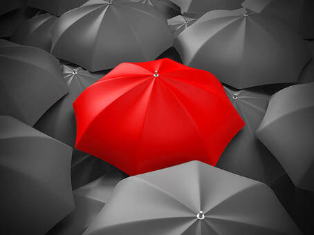 Rainmkrs-stand out among the crowd (red umbrella in sea of black umbrellas)